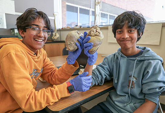 Students posing in a science lab